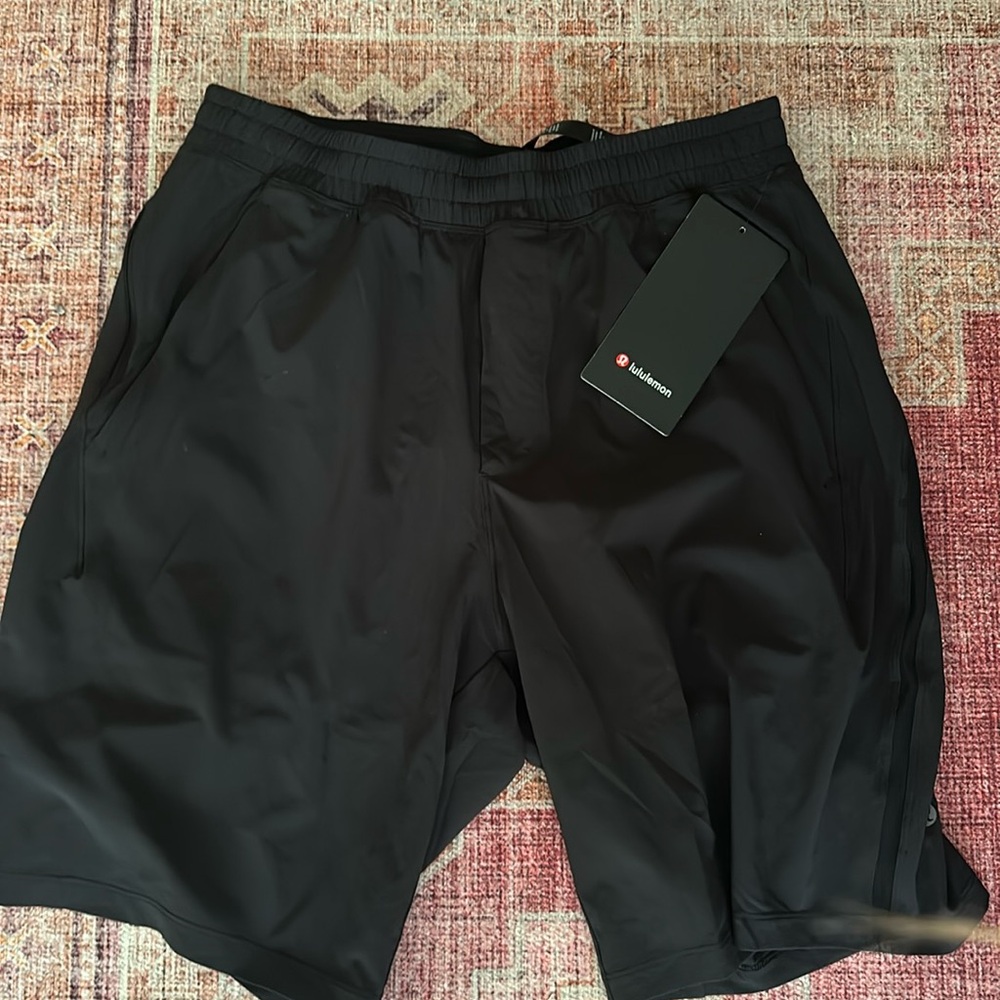 Lululemon men’s shorts-never worn